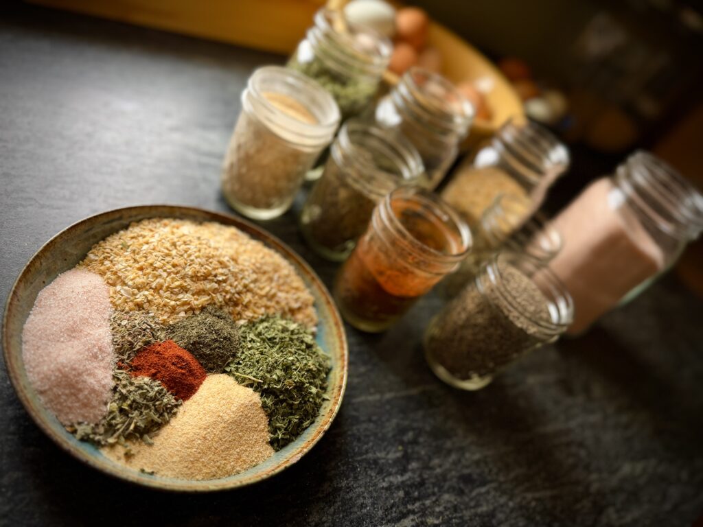 ingredients for homemade ranch seasoning mix with dried herbs and spices