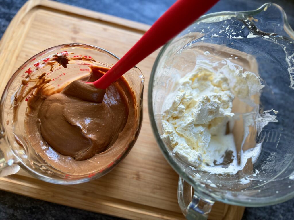 Chocolate custard lightened with a small amount of whipped cream before folding in the remaining whipped cream.