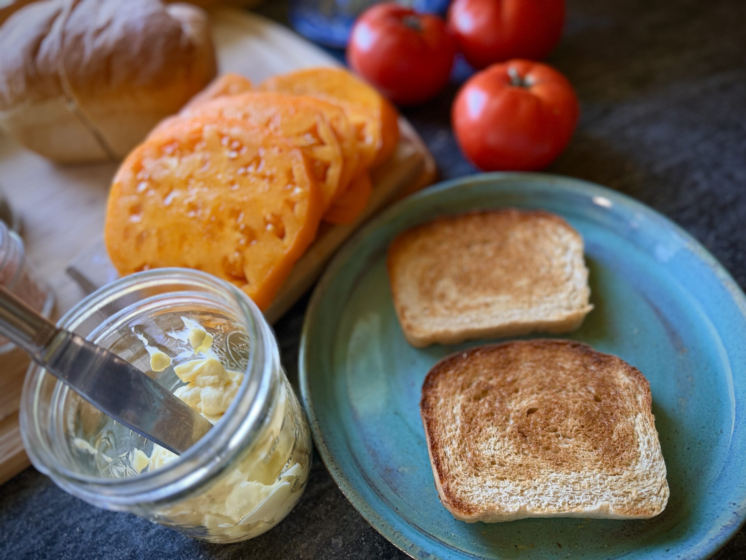 Slices of homemade bread toasted for tomato toast