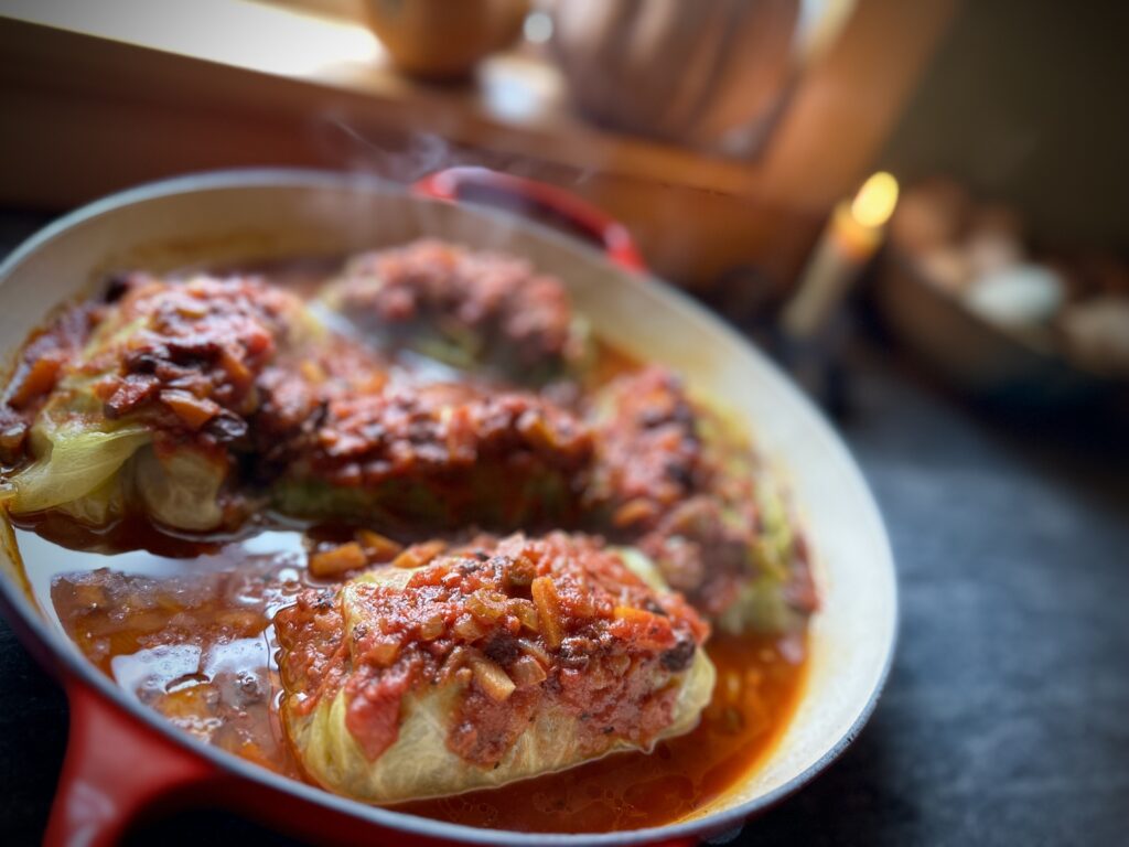 Old fashioned stuffed cabbage rolls with ground beef and rice in homemade tomato sauce